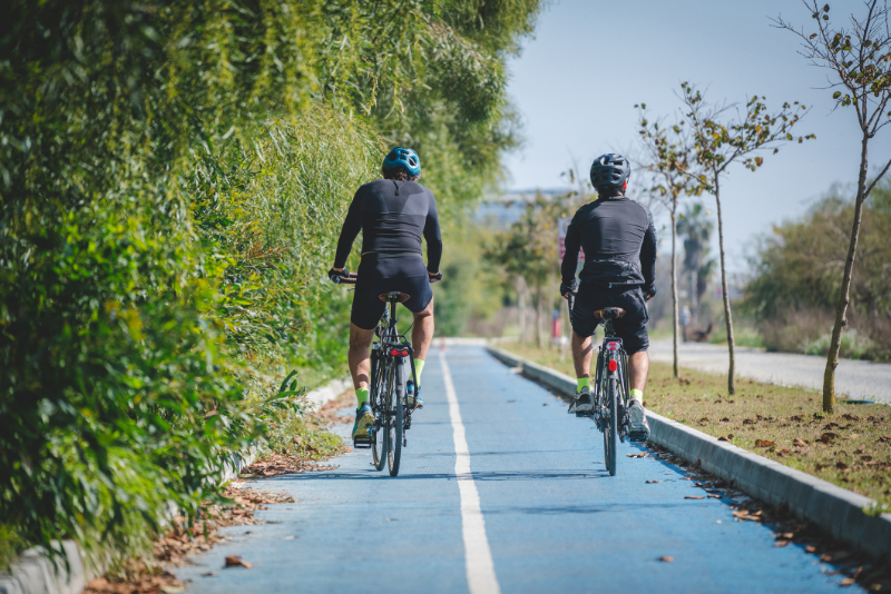 two friend riding road bicycles